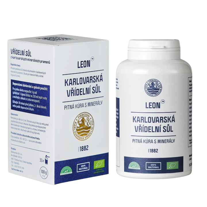 Karlovarská vřídelní sůl LEON 100 g v bílé dóze vedle papírové krabičky.